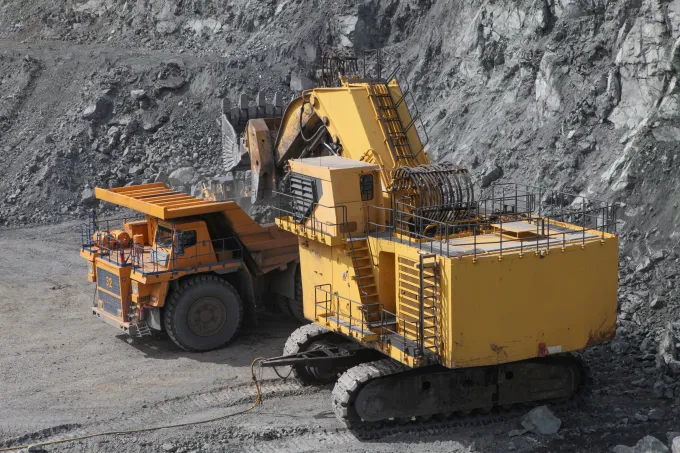 excavator and truck